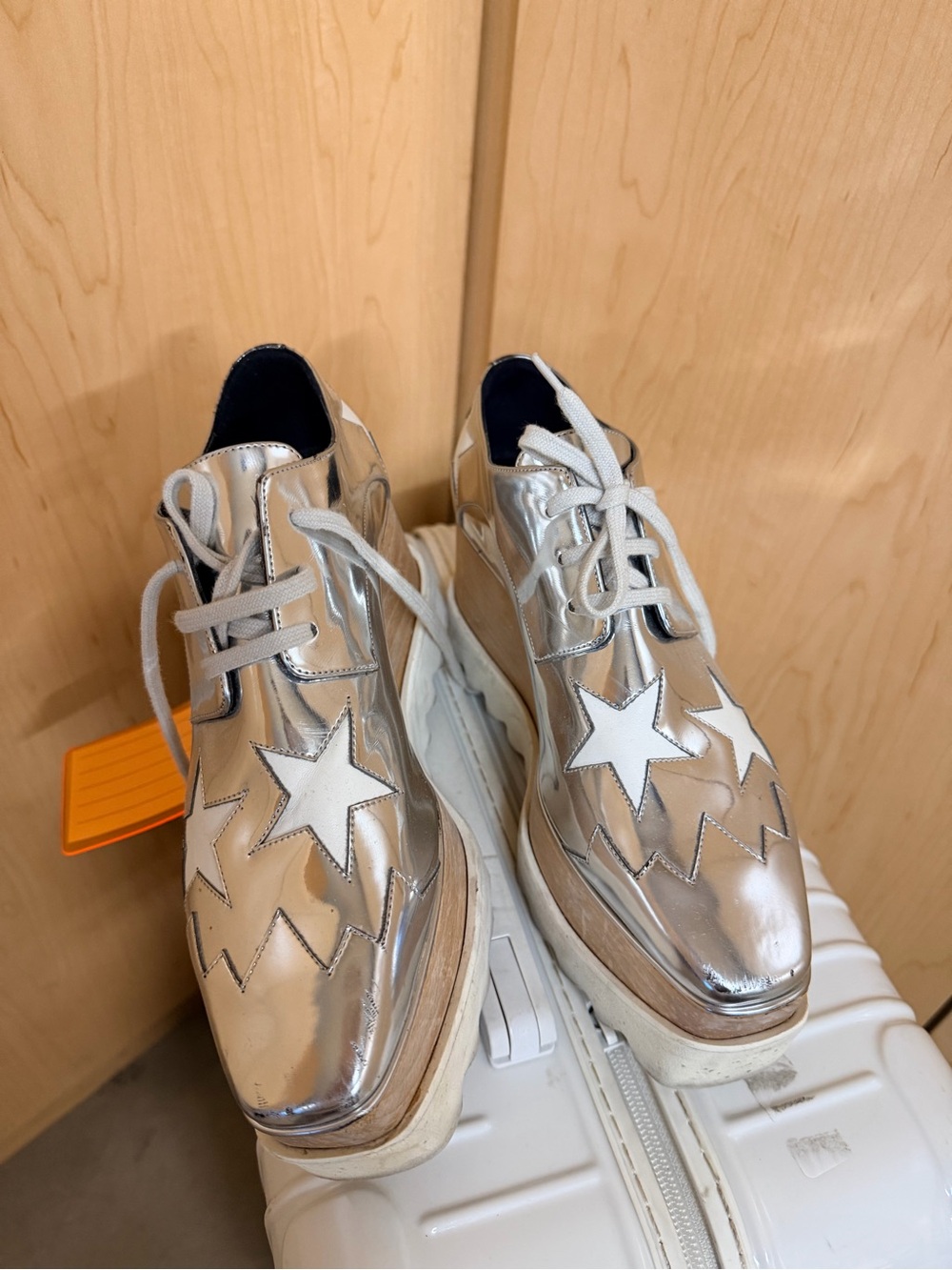 Stella McCartney Elyse Silver
Platforms featuring star patches.